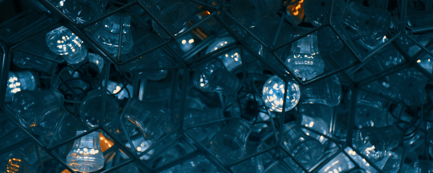 light bulbs in a cage, symbol for disruptions in the energy sector