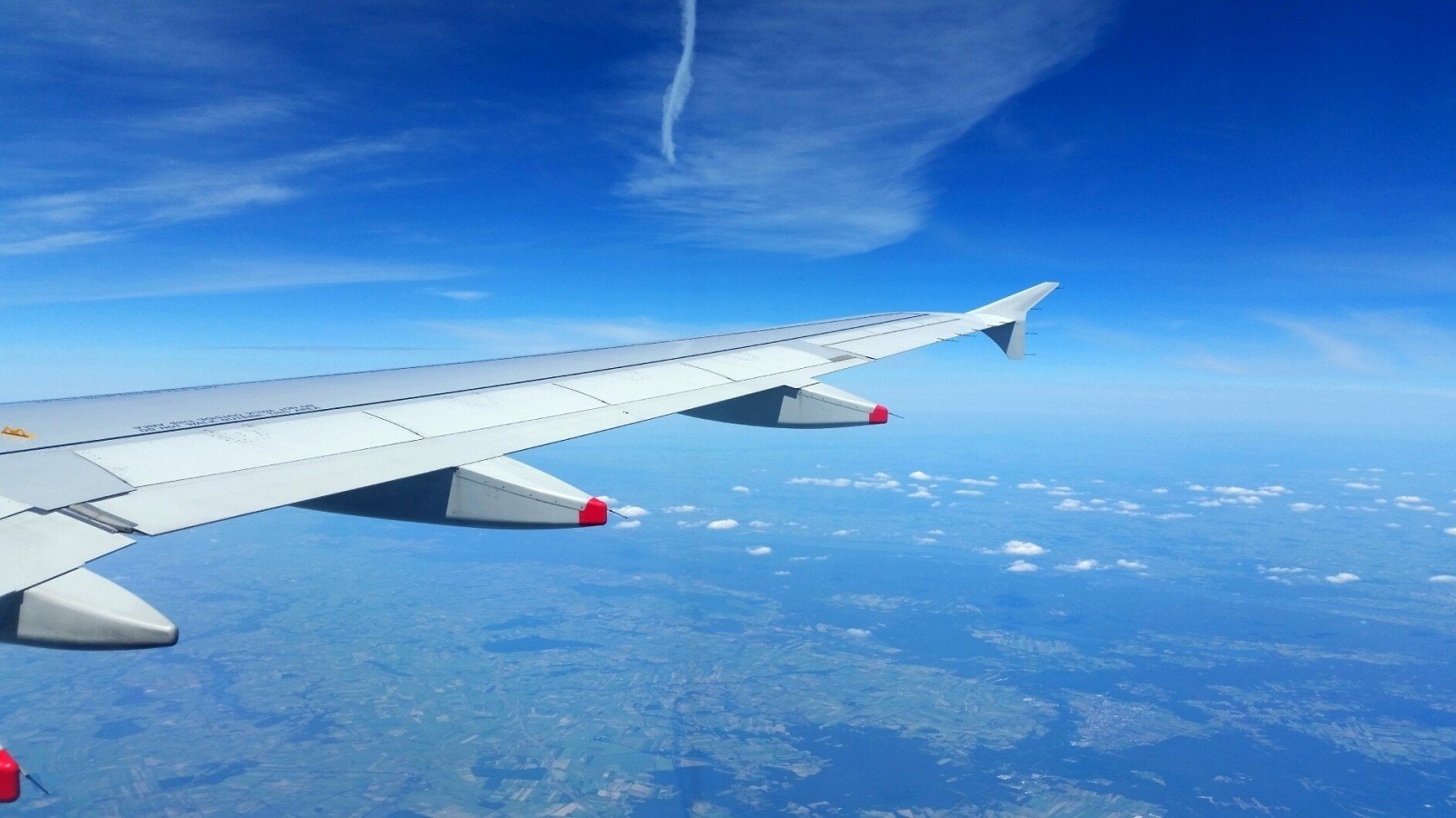 aerial-view-of-blue-landscape-from-plane-interior