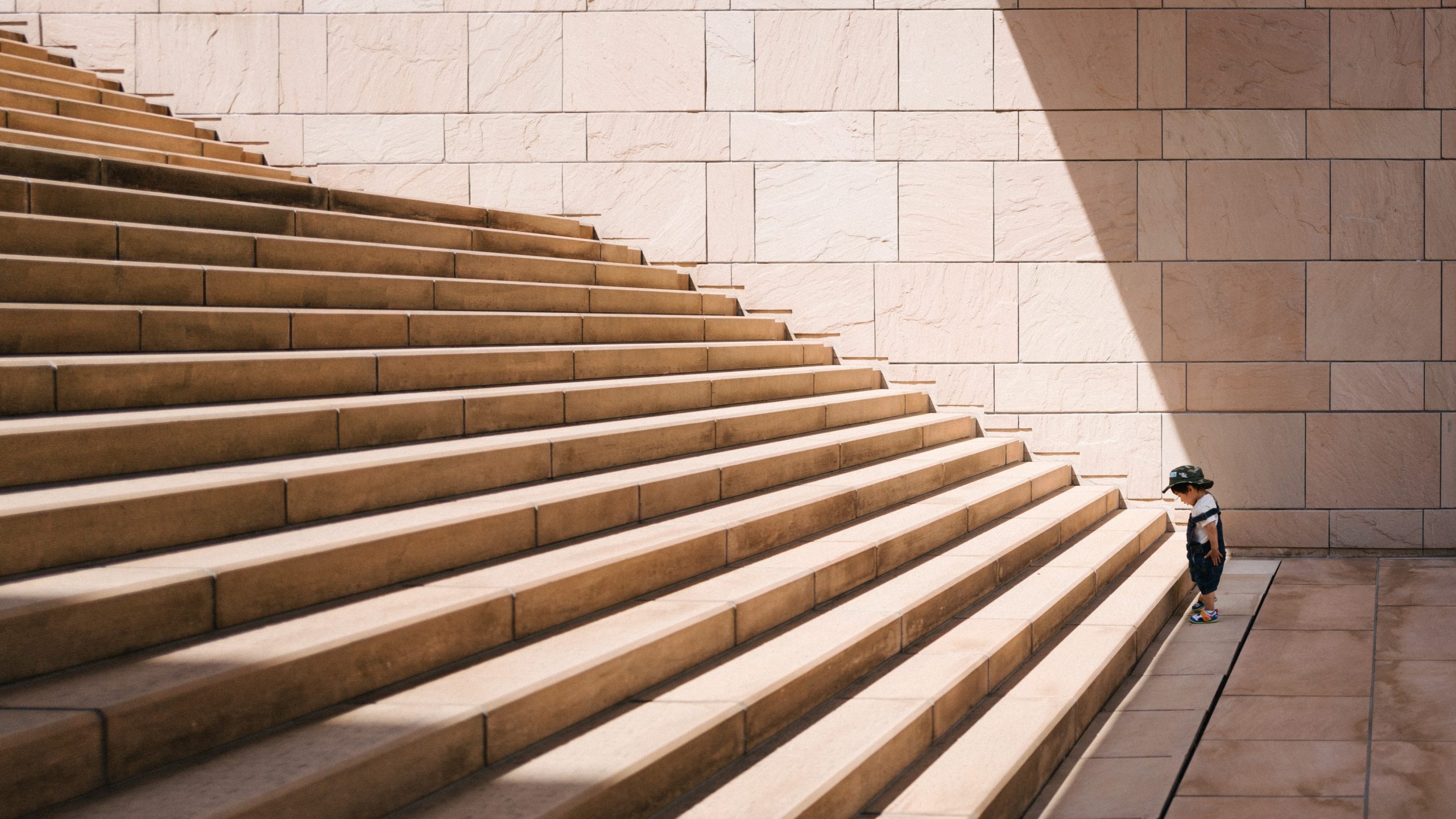 kid looking at stairs